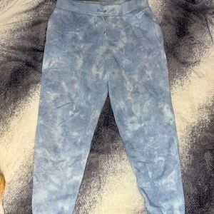 Victoria’s Secret blue/white sweatpants with pockets and v s detailed strings.